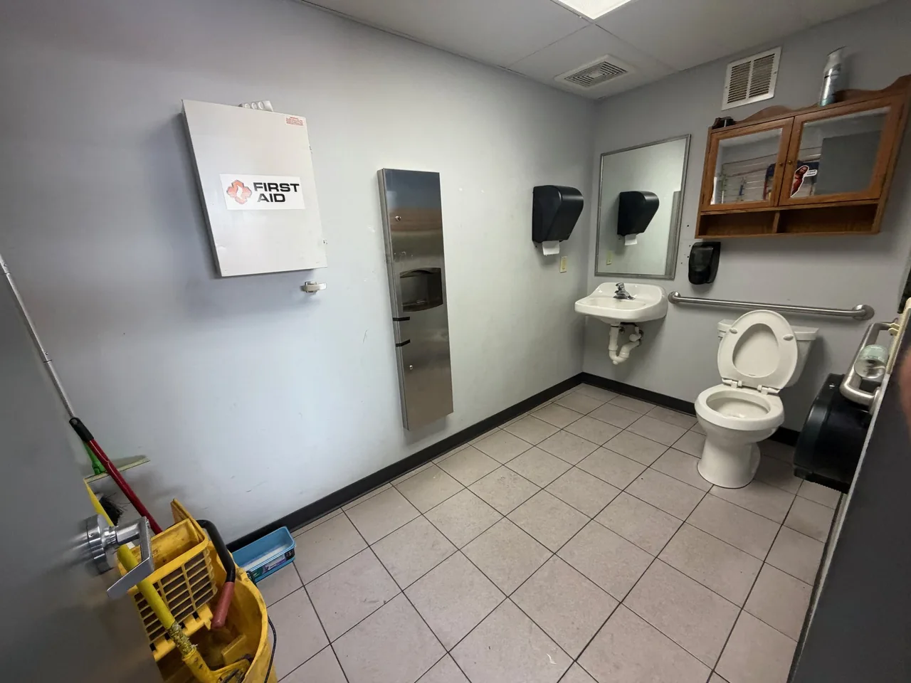 Recent Star Pro commercial clean: ADA-accessible restroom with grab bars, fixtures wiped, and floor scrubbed