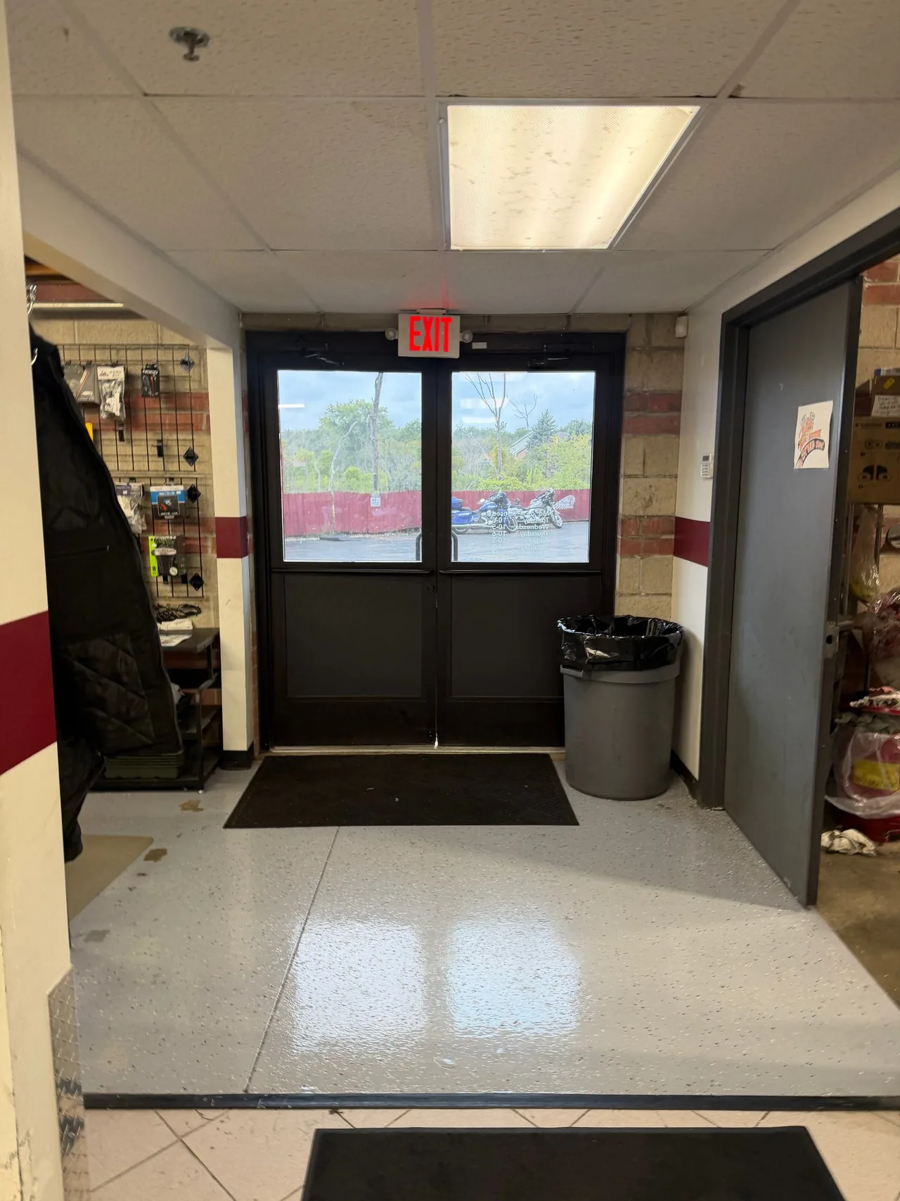 Recent Star Pro commercial clean: entryway with glass doors, glossy floor, and common-area details finished