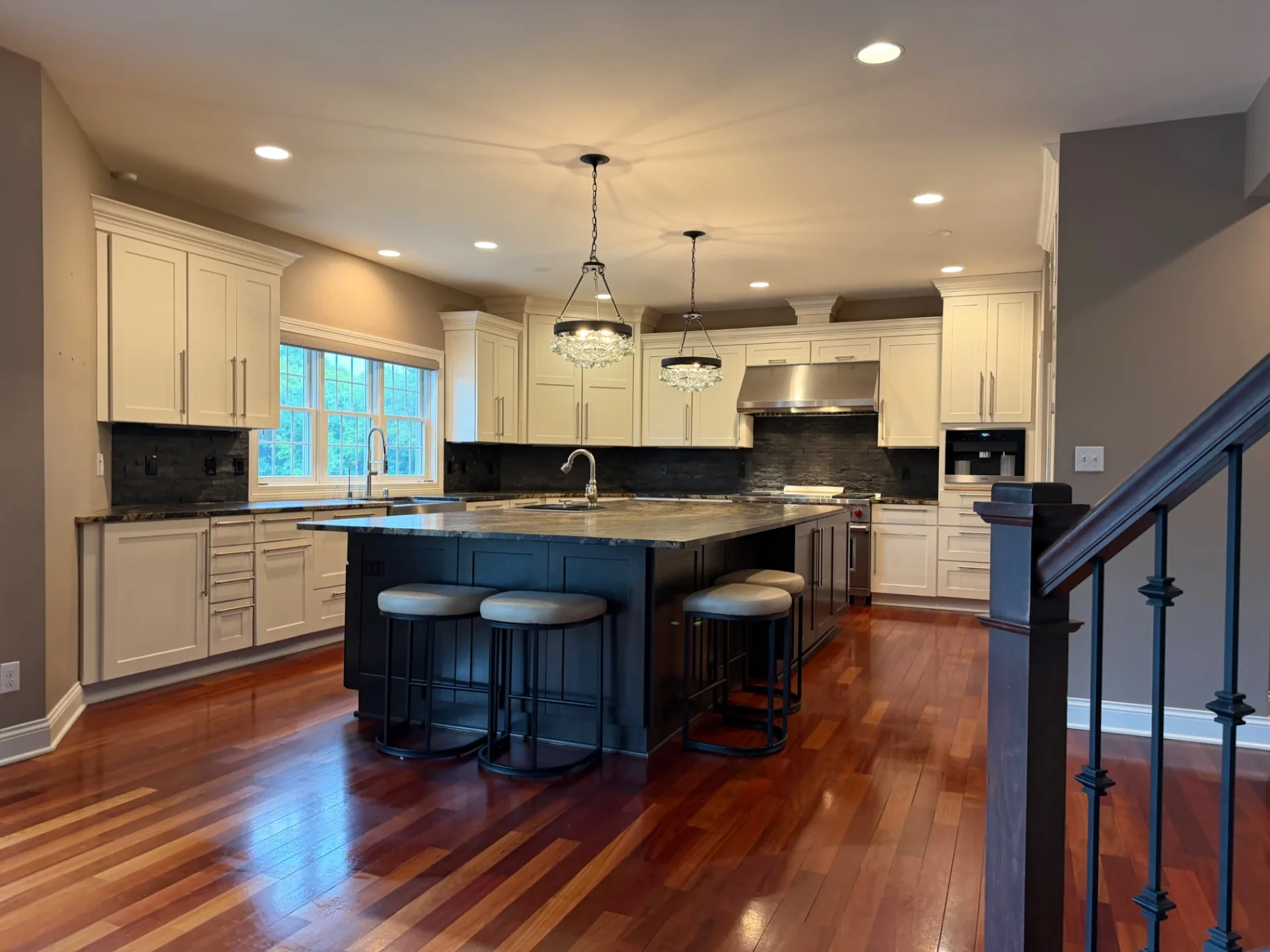 Kitchen with large island, cleaned and reset during a move-out clean
