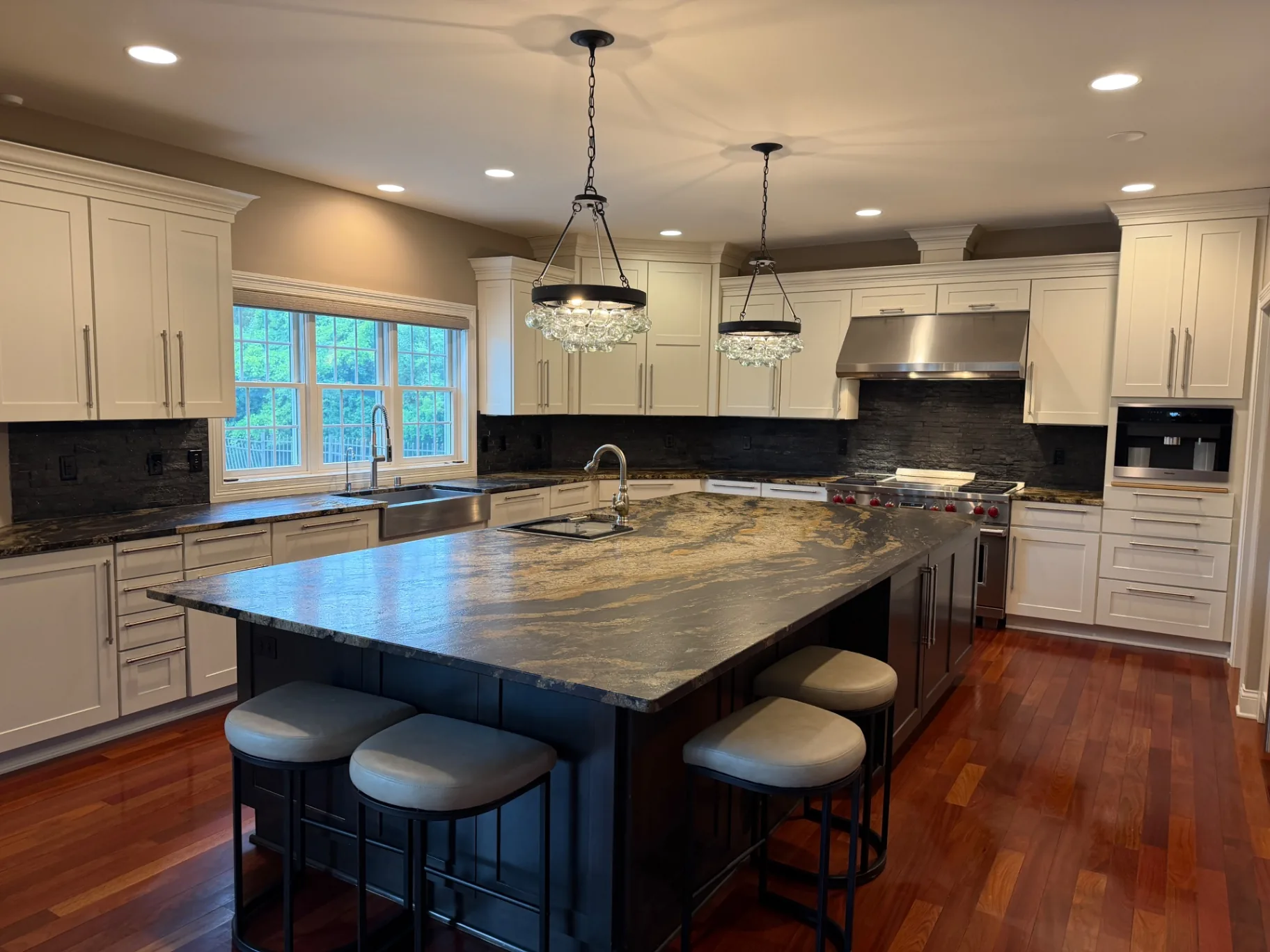Kitchen island and counters detailed during a real Star Pro move-out clean